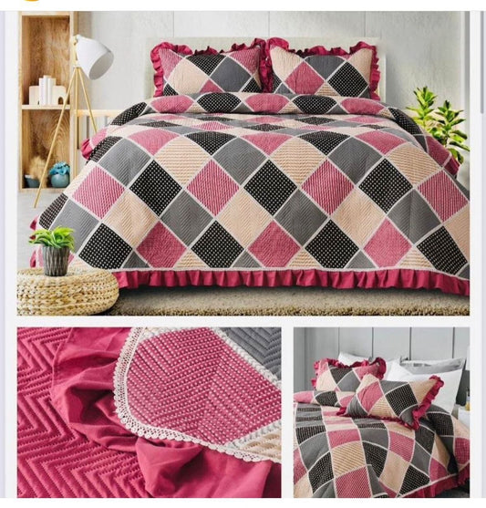 Soft Pink Printed Quilted Bedcover With Frill On The Three Bedside