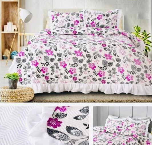 Magenta Printed Quilted Bedcover With Frill On The Three Bedside