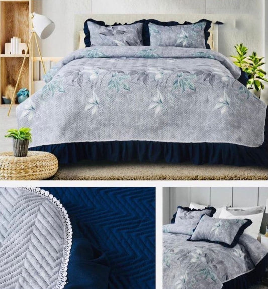 Cool Grey Printed Quilted Bedcover With Frill On The Three Bedside